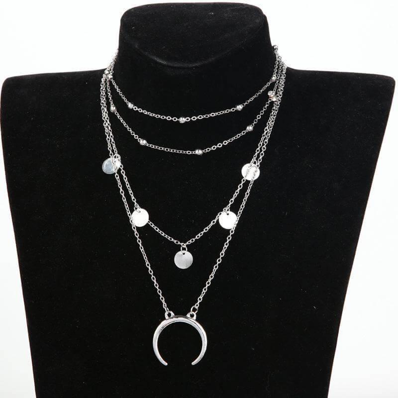 Crescent Horn Moon Layered Necklace with adjustable chain in high-quality zinc alloy, featuring silver-tone layered design.